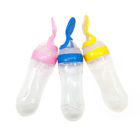 Toxin Free Feeding Bottle With Spoon , Silicone Squeeze Feeder With Dust Cover